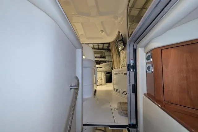 Tigress Yacht Photos Pics Interior view of 2002 Sea Ray 550 Sundancer yacht, showcasing sleek design and modern amenities.