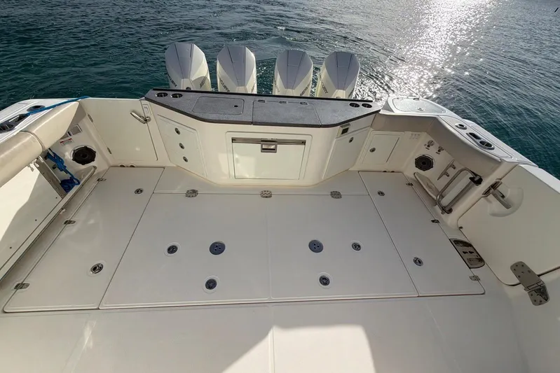  Yacht Photos Pics Boston Whaler 405 Conquest 2022 boat deck with outboard motors and ocean view.