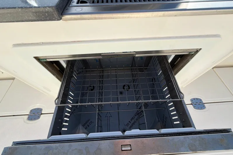  Yacht Photos Pics Open storage compartment on 2022 Boston Whaler 405 Conquest boat.