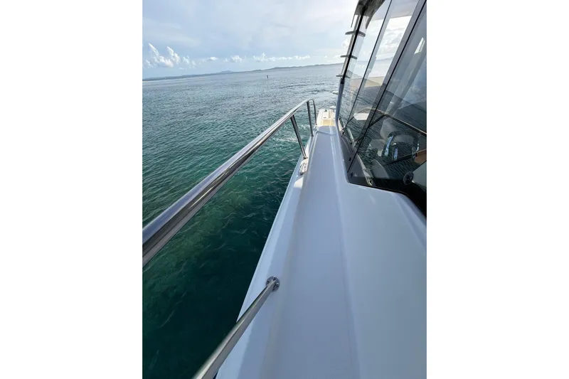  Yacht Photos Pics Boston Whaler 405 Conquest 2022 cruising on clear ocean waters.