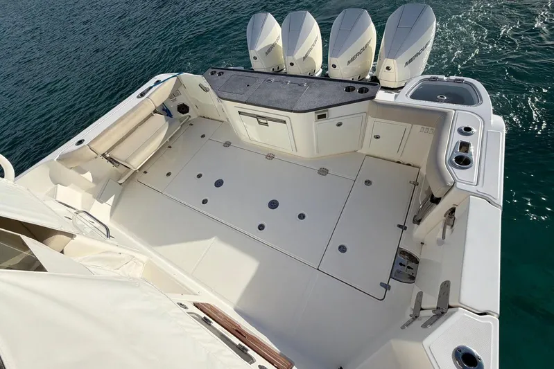  Yacht Photos Pics 2022 Boston Whaler 405 Conquest boat deck with four Mercury engines.