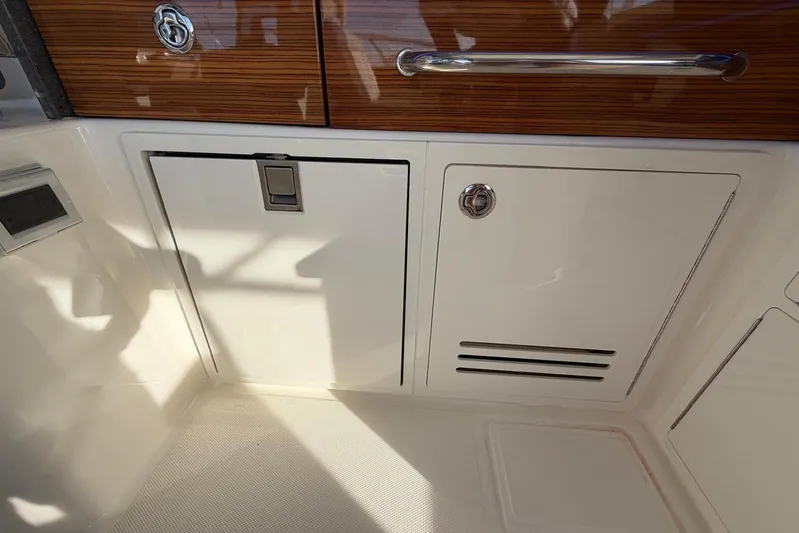 Yacht Photos Pics Interior storage compartments on a 2022 Boston Whaler 405 Conquest boat.