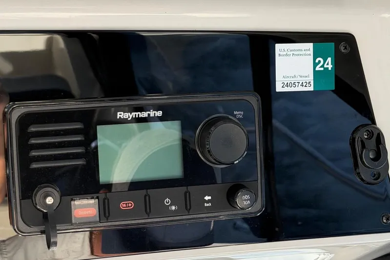  Yacht Photos Pics Raymarine control panel on 2022 Boston Whaler 405 Conquest with U.S. Customs sticker.