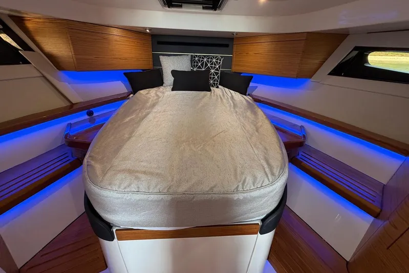  Yacht Photos Pics Luxurious interior of 2022 Boston Whaler 405 Conquest with ambient blue lighting.