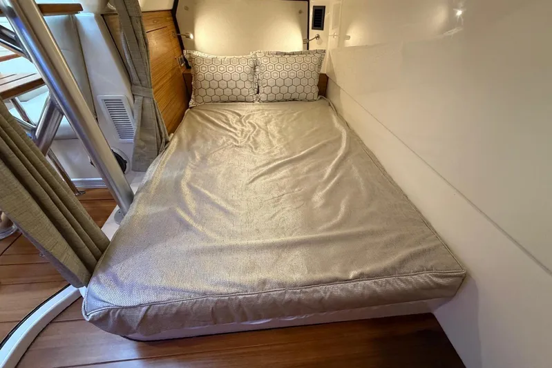  Yacht Photos Pics Cozy cabin bed in 2022 Boston Whaler 405 Conquest boat interior.