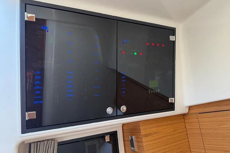  Yacht Photos Pics Electrical panel on a 2022 Boston Whaler 405 Conquest boat interior.