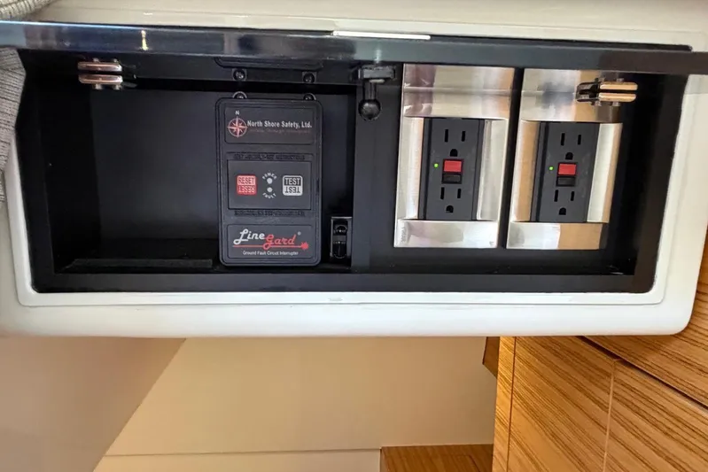  Yacht Photos Pics Electrical panel with outlets and safety device on 2022 Boston Whaler 405 Conquest.