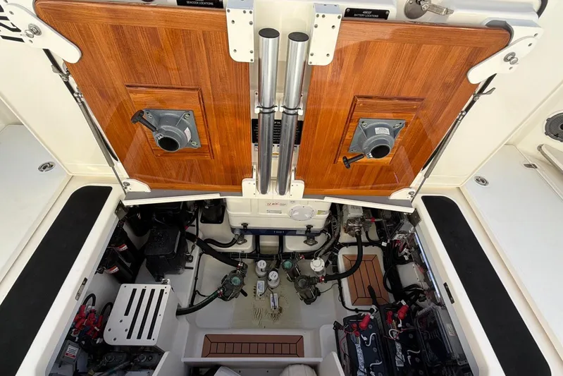  Yacht Photos Pics Engine compartment of 2022 Boston Whaler 405 Conquest, showcasing detailed mechanical components.