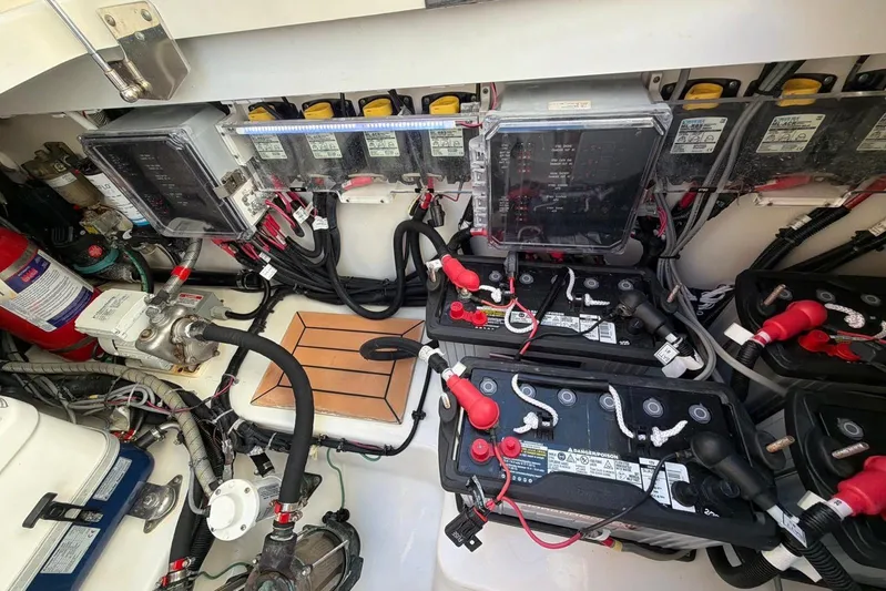  Yacht Photos Pics Electrical system of a 2022 Boston Whaler 405 Conquest boat, featuring batteries and wiring.