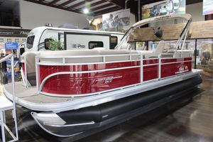 2025 Sun Tracker Party Barge 22 DLX pontoon boat displayed indoors.