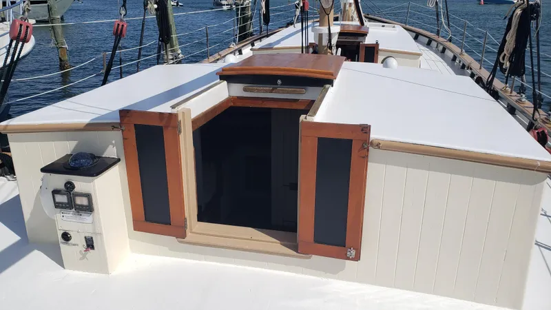 Daniel Webster Clements Yacht Photos Pics 1996 Custom Biloxi Schooner deck with open cabin doors and nautical equipment.
