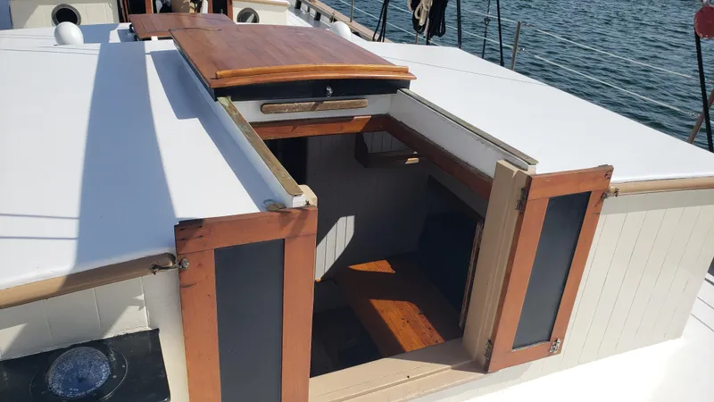 Daniel Webster Clements Yacht Photos Pics Biloxi Schooner 1996 cabin entrance with wooden doors and white deck.