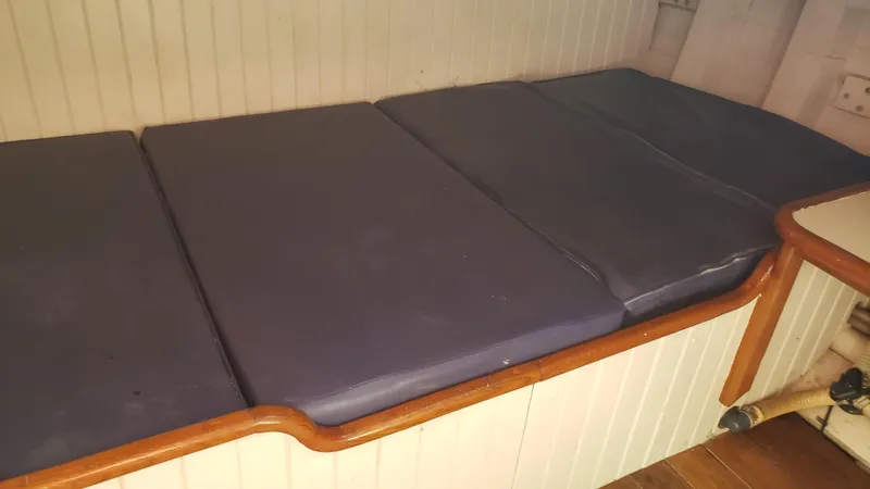 Daniel Webster Clements Yacht Photos Pics Cushioned seating area on a 1996 Custom Biloxi Schooner.