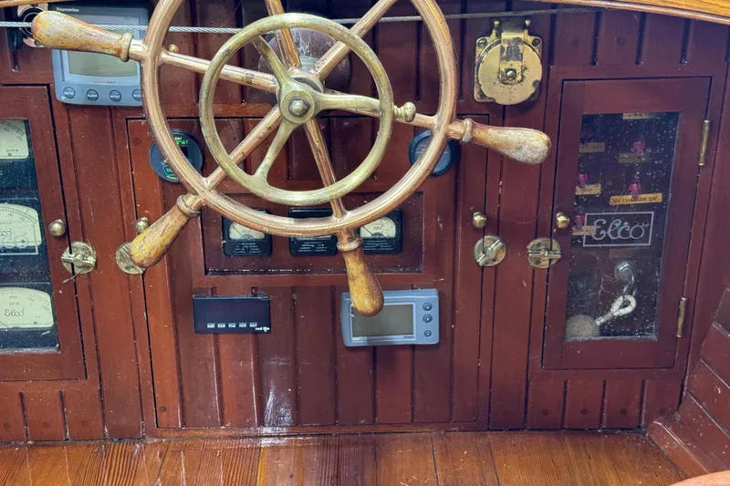 Annie Yacht Photos Pics Wooden helm of 1989 Elco 30 Fantail Electric Launch with vintage gauges.