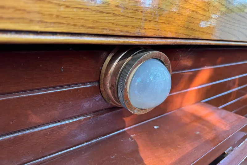 Annie Yacht Photos Pics Close-up of a wooden detail on a 1989 Elco 30 Fantail Electric Launch.