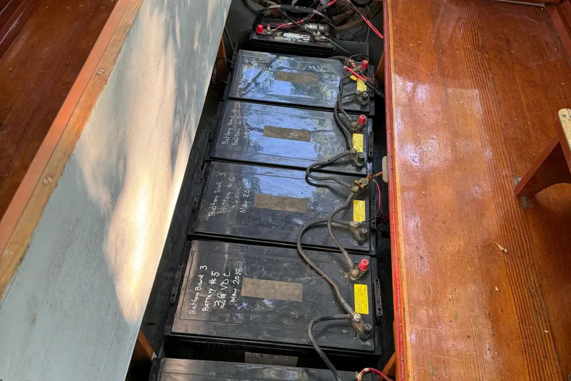 Annie Yacht Photos Pics Batteries inside 1989 Elco 30 Fantail Electric Launch, showcasing wiring and connections.