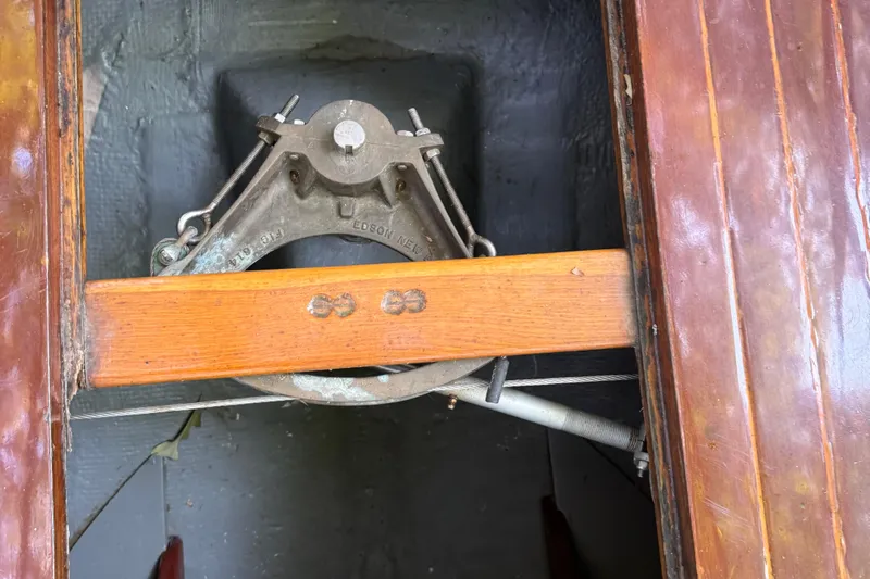 Annie Yacht Photos Pics Steering mechanism of 1989 Elco 30 Fantail Electric Launch, featuring wooden and metal components.