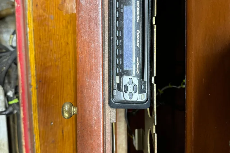 Annie Yacht Photos Pics Pioneer stereo system in wooden interior of 1989 Elco 30 Fantail Electric Launch.