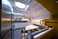 Luxurious kitchen interior of 2009 Maiora 31 yacht with modern design and skylight.