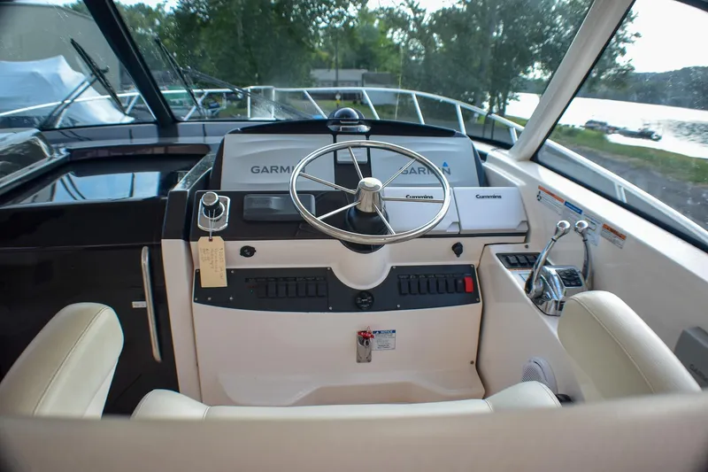 Fifth Case Yacht Photos Pics Helm of 2016 Tiara Yachts 4300 Open with Garmin navigation system and Cummins controls.