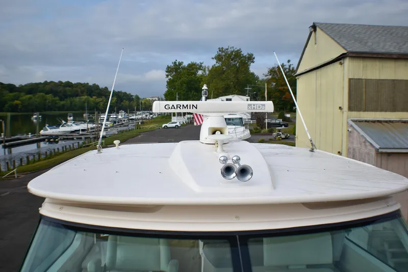 Fifth Case Yacht Photos Pics 2016 Tiara Yachts 4300 Open with Garmin radar, docked near marina.