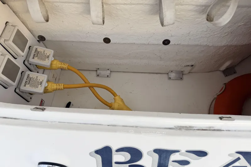  Yacht Photos Pics 2006 Sea Ray 340 Sundancer shore power connections with yellow cables and life preserver.