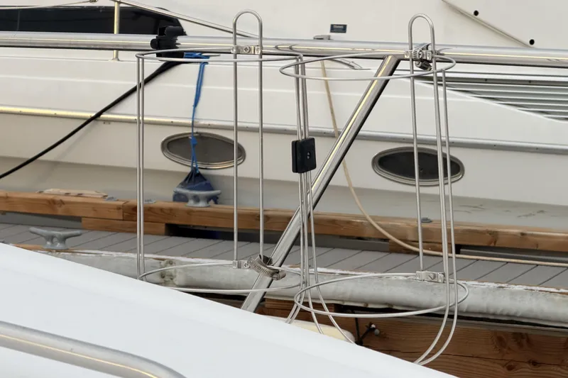  Yacht Photos Pics 2006 Sea Ray 340 Sundancer docked, showcasing stainless steel railings and deck details.