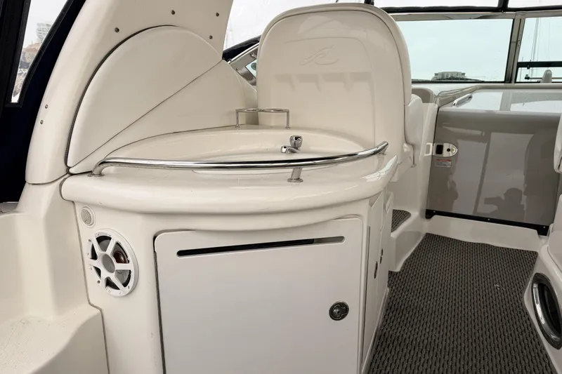  Yacht Photos Pics 2006 Sea Ray 340 Sundancer boat interior with sink and speaker.
