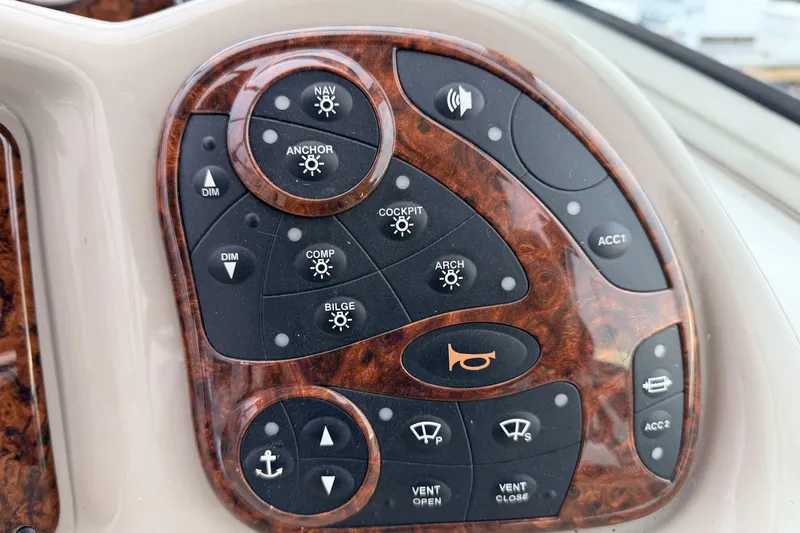  Yacht Photos Pics Control panel of a 2006 Sea Ray 340 Sundancer boat with various function buttons.