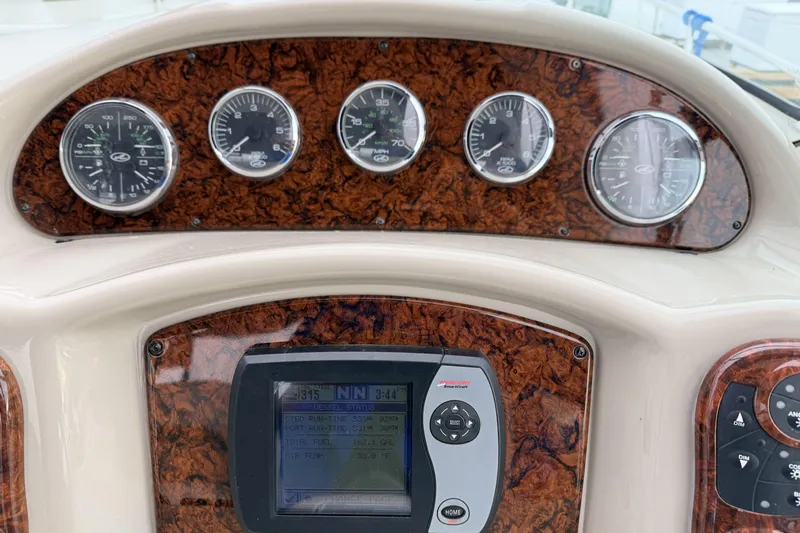  Yacht Photos Pics Dashboard of 2006 Sea Ray 340 Sundancer with gauges and navigation display.