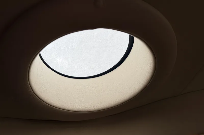  Yacht Photos Pics Circular skylight on 2006 Sea Ray 340 Sundancer boat interior ceiling.
