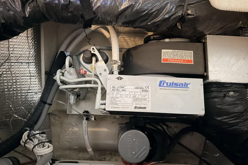  Yacht Photos Pics Cruisair unit in 2006 Sea Ray 340 Sundancer engine compartment, showcasing wiring and components.