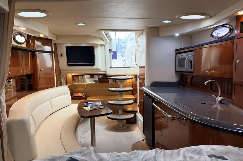  Yacht Photos Pics Luxurious interior of a 2006 Sea Ray 340 Sundancer yacht with modern amenities.
