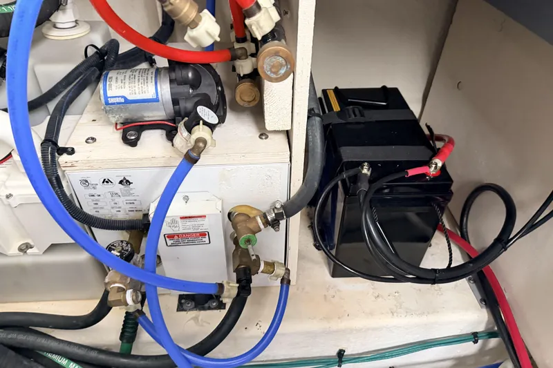  Yacht Photos Pics Engine compartment of 2006 Sea Ray 340 Sundancer with battery and wiring.