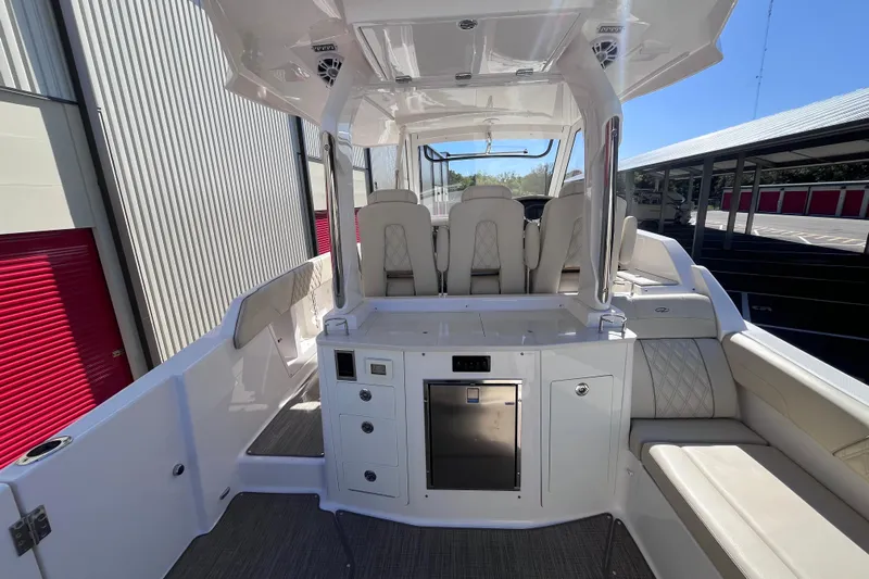  Yacht Photos Pics 2019 Regal 33 SAV boat interior with seating and storage compartments.