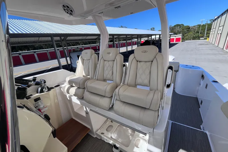  Yacht Photos Pics 2019 Regal 33 SAV boat interior with luxurious seating and modern design.