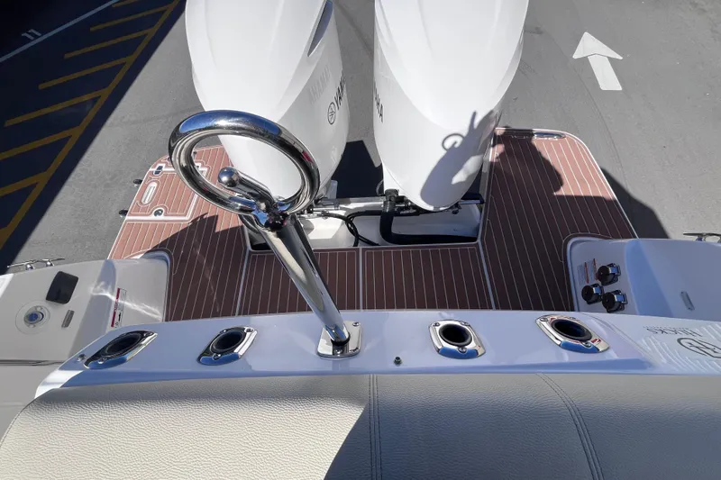  Yacht Photos Pics 2019 Regal 33 SAV boat deck with Yamaha engines and polished railing.
