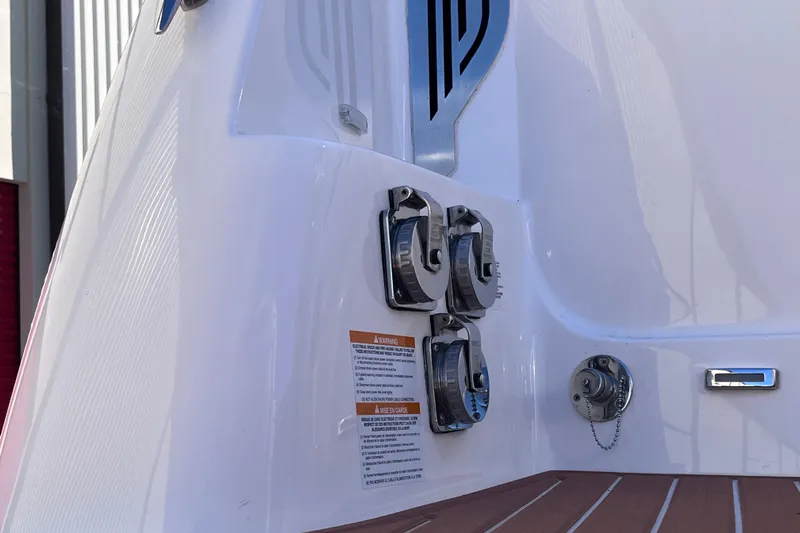  Yacht Photos Pics 2019 Regal 33 SAV boat stern with fuel caps and warning labels.