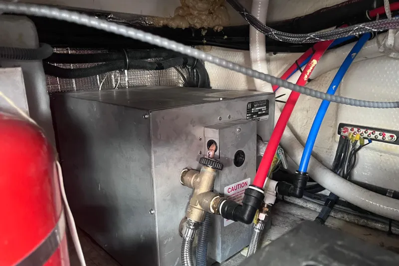  Yacht Photos Pics 2019 Regal 33 SAV engine compartment with wiring and plumbing connections.