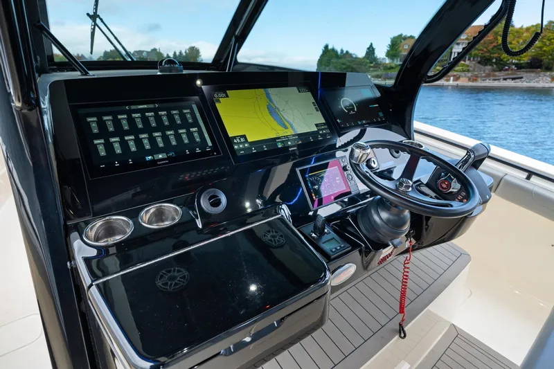 Yacht Photos Pics 2023 Scout 425 LXF boat dashboard with advanced navigation and control systems.
