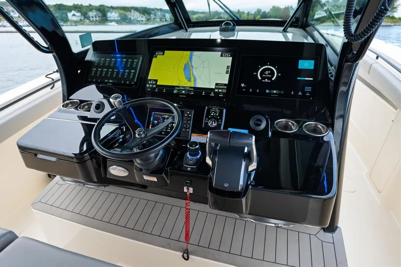  Yacht Photos Pics 2023 Scout 425 LXF boat dashboard with advanced navigation and control systems.