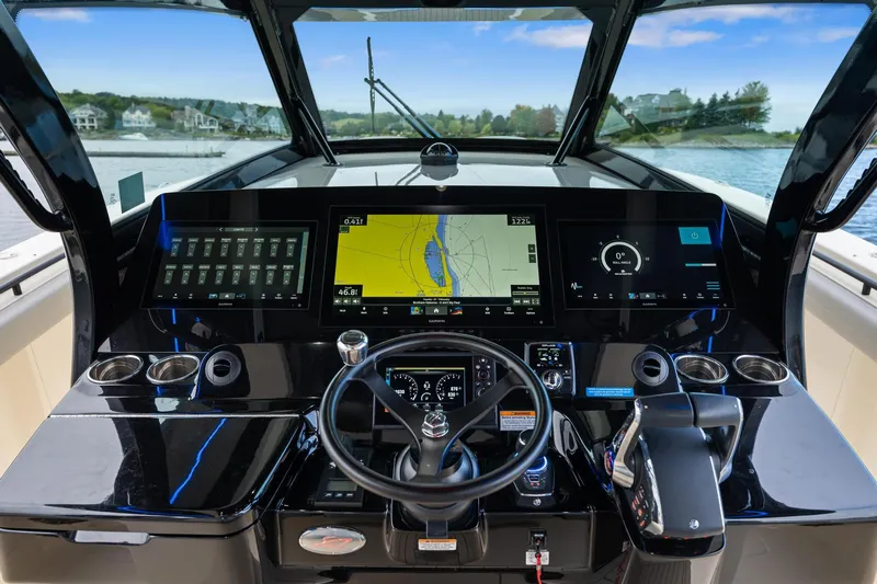 Yacht Photos Pics 2023 Scout 425 LXF boat dashboard with advanced navigation and control systems.