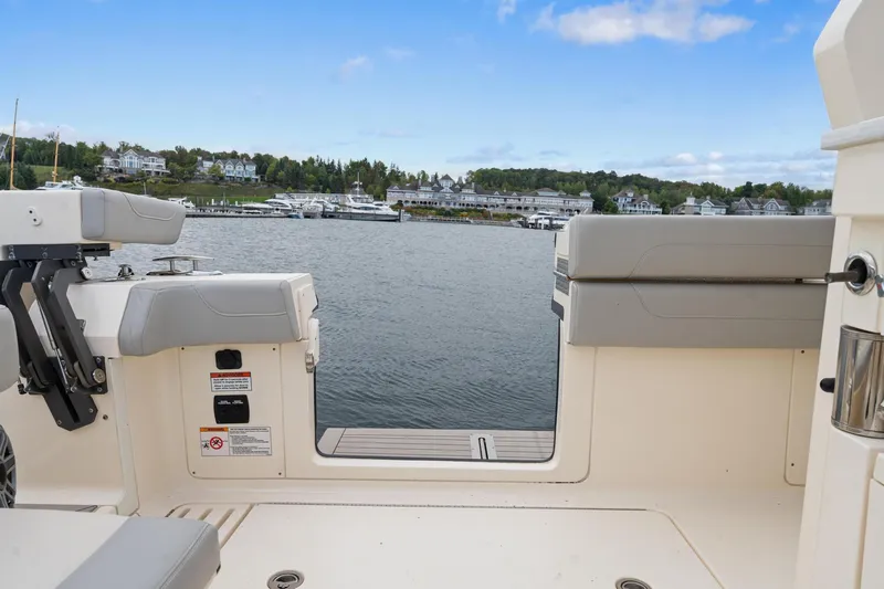  Yacht Photos Pics 2023 Scout 425 LXF boat interior with waterfront view.