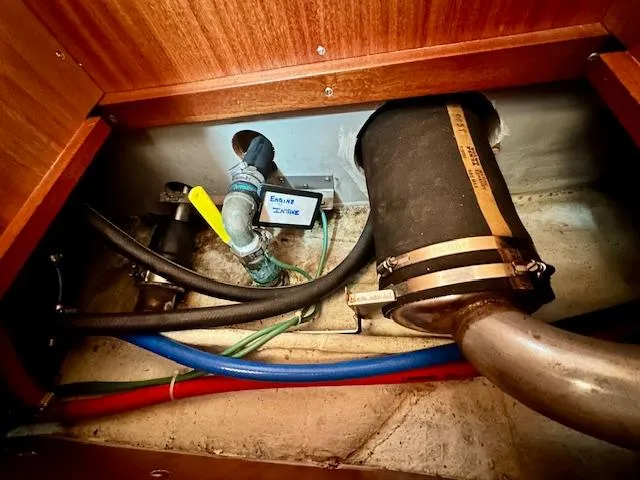  Yacht Photos Pics Vilm 116 boat engine compartment, 2002 model, showing hoses and exhaust system.