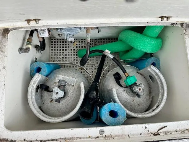  Yacht Photos Pics Boat storage compartment with gas cylinders and hoses, Vilm 116, 2002 model.