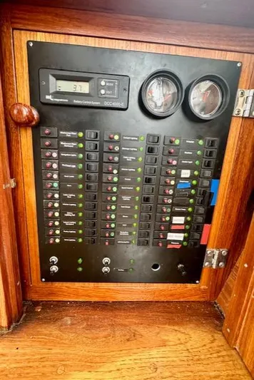  Yacht Photos Pics Electrical control panel on a 2002 Vilm 116 boat with gauges and switches.