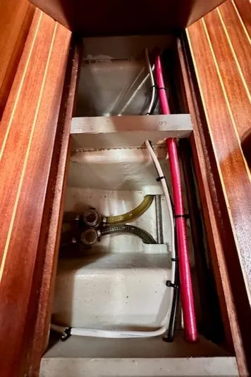  Yacht Photos Pics Vilm 116 yacht interior plumbing system, 2002 model, with wooden paneling.