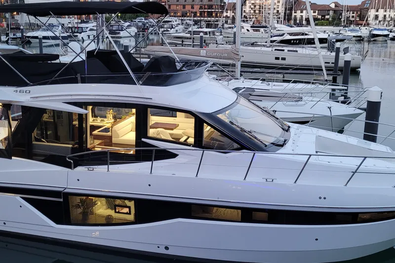 Alouise Yacht Photos Pics Luxury 2022 Galeon 460 Fly yacht docked at marina during sunset.