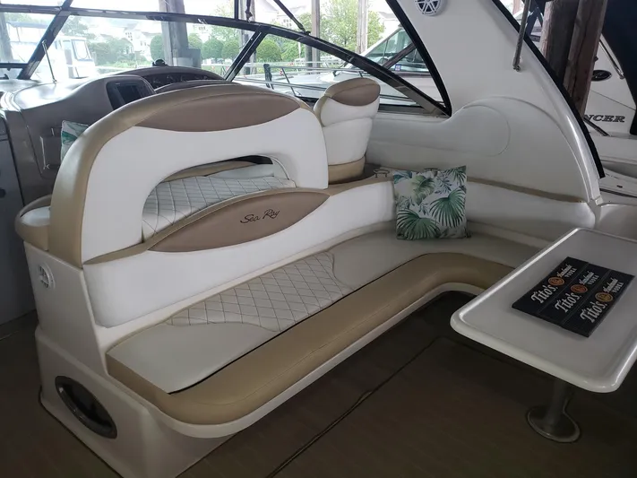 Escondite Yacht Photos Pics Luxurious interior of 2001 Sea Ray 410 Sundancer with elegant seating and table.