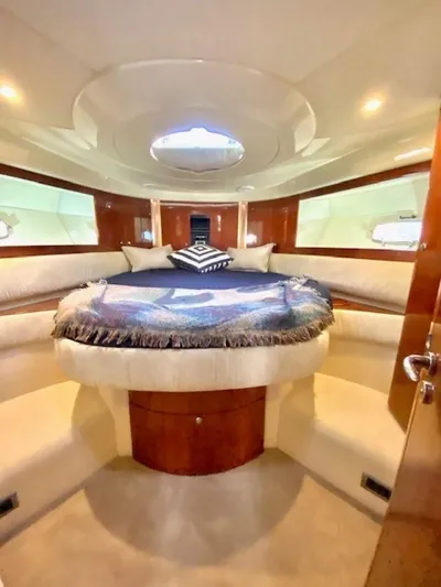 Mahalo Yacht Photos Pics Luxurious interior of 2007 Fairline Targa 52 yacht with elegant seating and decor.